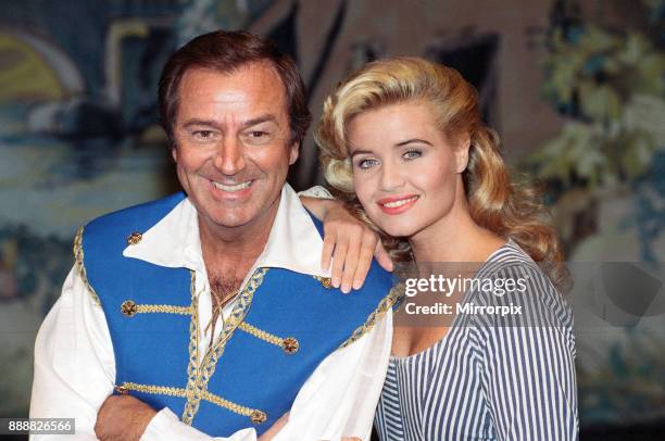 Des O'Connor as Buttons and Jodie Wilson as Cinderella appearing in Cinderella at the New Victoria Theatre, 15th December 1992.