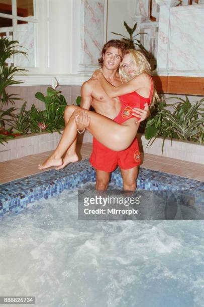 Baywatch stars in a photocall, in London, for the TV series now appearing on British Television. Picture shows Pamela Anderson and David Charvet...