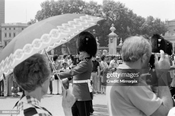Changing of the Guard in London today. The Guards begin to wilt at the knees in the hot sunshine, 8th June 1976.