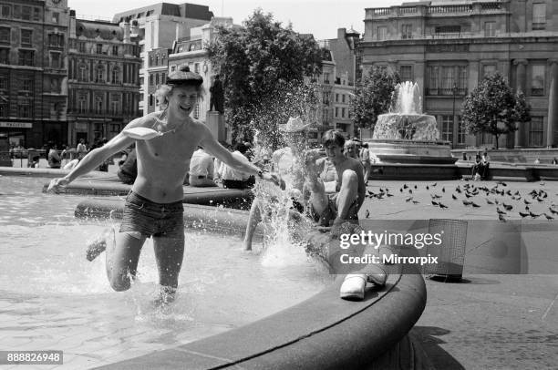 Heatwave in Trafalgar Square. As the temperatures soared into the 80s again today, the cool fountains in Trafalgar Square were even more tempting to...