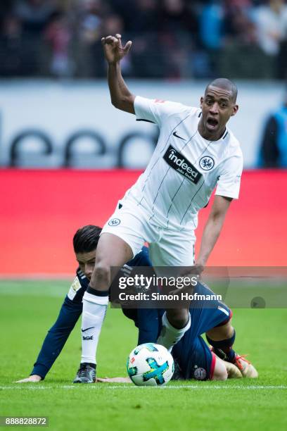 Gelson Fernandes of Frankfurt is challenged by James Rodriguez of Muenchen during the Bundesliga match between Eintracht Frankfurt and FC Bayern...