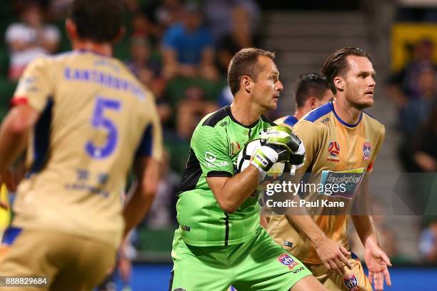 Glen Moss of the Jets saves a shot on goal during the round 10 A-League match between the Perth Glory and the Newcastle Jets at nib Stadium on...