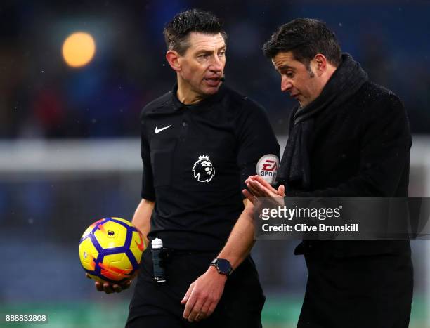 Marco Silva, Manager of Watford confronts referee Lee Probert at half time during the Premier League match between Burnley and Watford at Turf Moor...