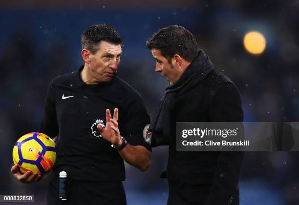 Marco Silva, Manager of Watford confronts referee Lee Probert at half time during the Premier League match between Burnley and Watford at Turf Moor...