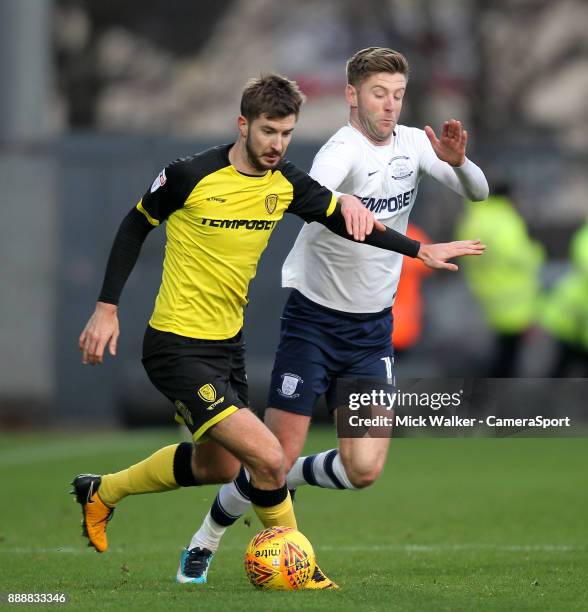 Preston North End's Paul Gallagher in action with Burton Albion's Luke Murphy during the Sky Bet Championship match between Burton Albion and Preston...