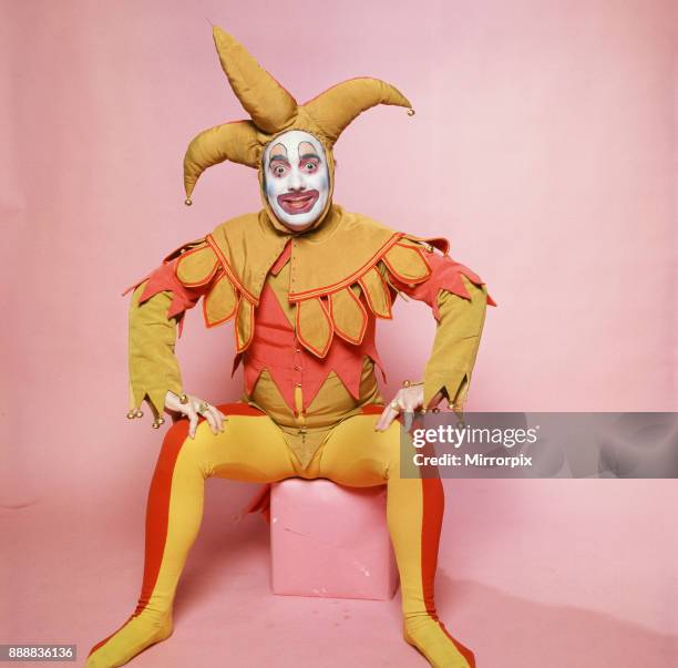 Keith Moon, drummer of The Who rock group, pictured in the Daily Mirror studios, dressed in court jester costume and make up to entertain the...