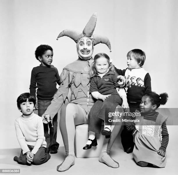 Keith Moon, drummer of The Who rock group, pictured in the Daily Mirror studios, dressed in court jester costume and make up to entertain the...