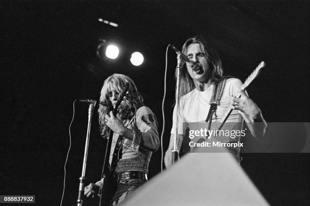 Status Quo perform at The Reading Festival on Saturday 25th August 1973. Picture shows Rick Parfitt and Francis Rossi The festival was then called...