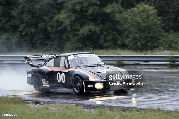 Danny Ongais qualifies a Porsche 935 in the rain for the IMSA race held at Brainerd International Raceway on June 17, 1979 in Brainerd, Minnesota.