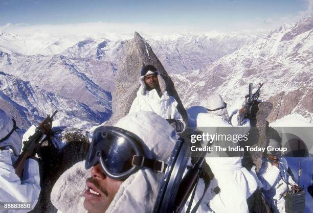 Indian Soldiers in winter clothing on the mountain heights of Kargil