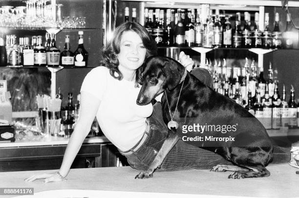Killer's Moon, photo-call to promote new film, London, 15th November 1978. Pictured, actress in film, Lisa Vanderpump aged 17, with doberman pinscher...