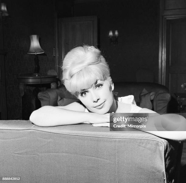 Stella Stevens, American film, television, and stage actress, pictured in hotel suite, London, 16th November 1964. Stella Stevens is in the UK to...