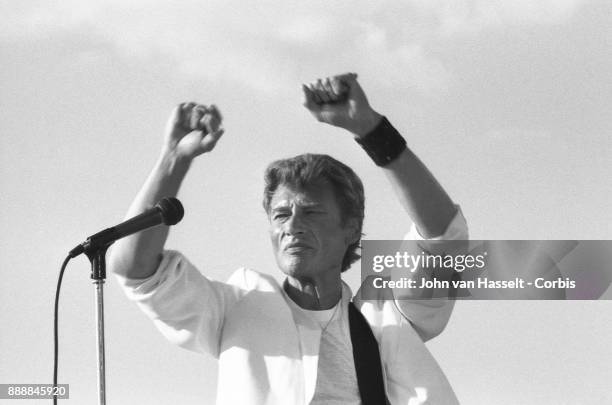 Johnny Hallyday gives a concert at La Fête de l'Humanité on September 15, 1985 in La Courneuve near Paris