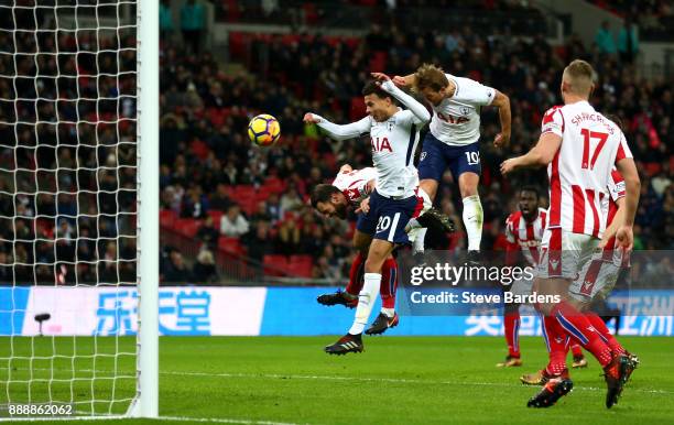 Harry Kane of Tottenham Hotspur scores his sides third goal during the Premier League match between Tottenham Hotspur and Stoke City at Wembley...