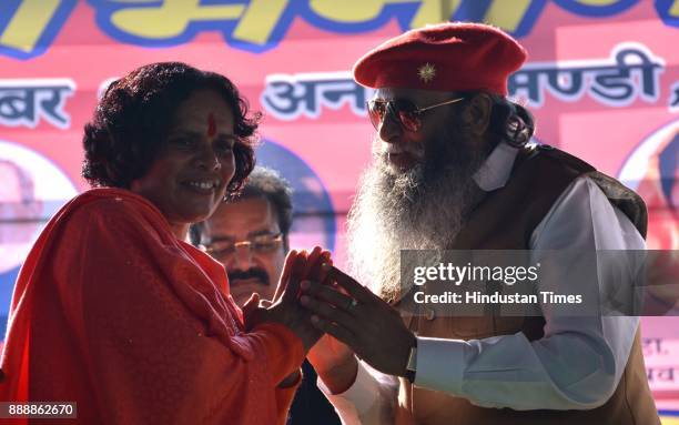 Haryana BJP leader Surajpal Amu and Vishwa Hindu Parishad leader Sadhvi Prachi, during a Swabhiman Rally, on December 9, 2017 in Panchkula, India.