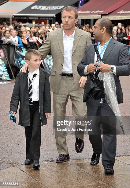 Director Guy Richie with his son Rocco attend the 'Harry Potter and the Half-Blood Prince' film premiere at the Odeon Leicester Square on July 7,...
