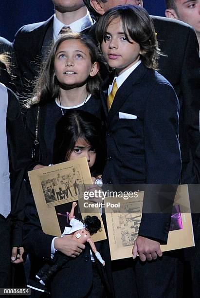 Paris Jackson Prince Michael Jackson I and Prince Michael Jackson II appear onstage during the Michael Jackson public memorial service held at...