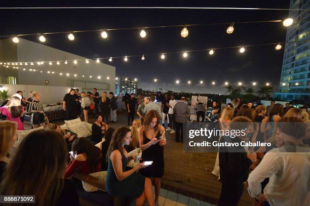 Guests attend Rosario Dawson Hosts The Launch Of Photo Butler At Art Basel With Anna Rothschild And Claudine De Niro at Soho House Miami on December...