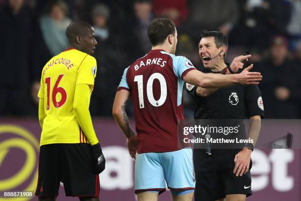 Ashley Barnes of Burnley argues with referee Lee Probert after a disallowed goal during the Premier League match between Burnley and Watford at Turf...