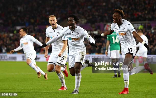Wilfried Bony of Swansea City celebrates after scoring his sides first goal during the Premier League match between Swansea City and West Bromwich...