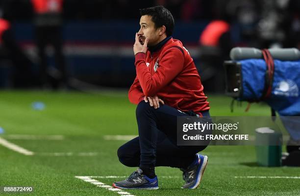 Lille's Portuguese interim head coach Joao Sacramento reacts during the French L1 football match between Paris Saint-Germain and Lille at the Parc...