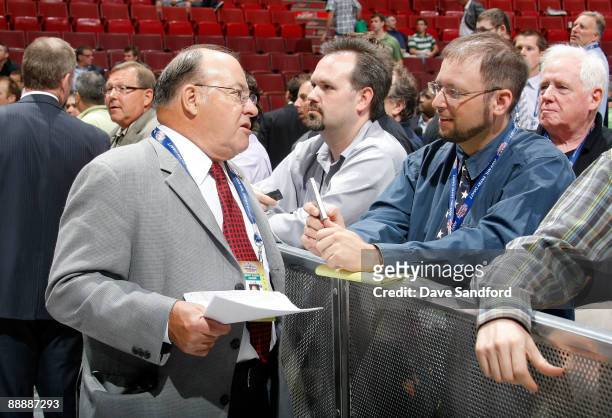 Scotty Bowman of the Chicago Blackhawks speaks to a journalist during the second day of the 2009 NHL Entry Draft at the Bell Centre on June 27, 2009...