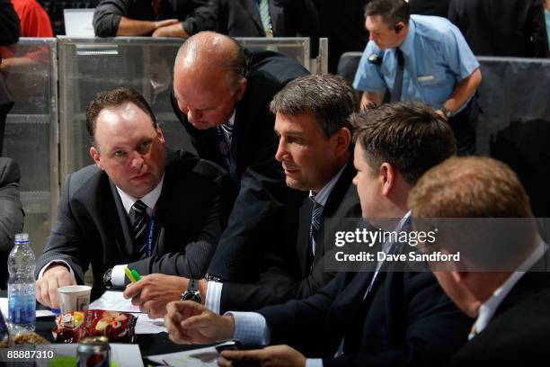 Director of Amateur Scouting Wayne Smith of the Boston Bruins looks on from the Bruins draft table during the second day of the 2009 NHL Entry Draft...