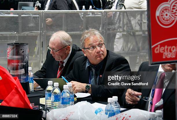 Detroit Red Wings Scout Marty Stein looks on from the Red Wings draft table during the second day of the 2009 NHL Entry Draft at the Bell Centre on...