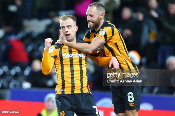 Hull City's Kamil Grosicki and David Meyler celebrate during the Sky Bet Championship match between Hull City and Brentford at KCOM Stadium on...