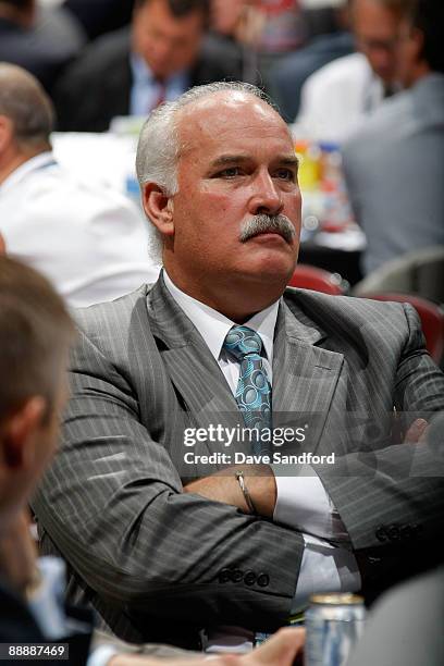 President John Davidson of the St. Louis Blues looks on from the Blues draft table during the second day of the 2009 NHL Entry Draft at the Bell...