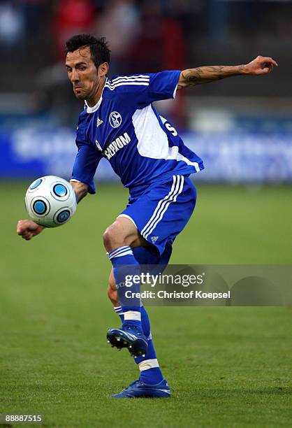 Vicente Sanchez of Schalke runs with the ball during the pre-season friendly match between FC Schalke 04 and Twente Enschede at the Vivaris Arena on...