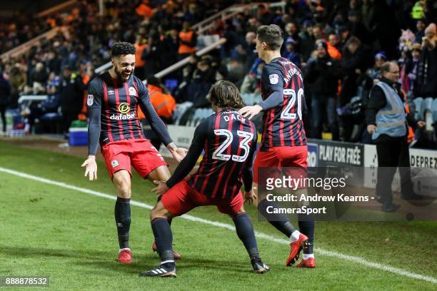 Blackburn Rovers' Bradley Dack celebrates scoring his side's third goal with his team mates during the Sky Bet League One match between Peterborough...