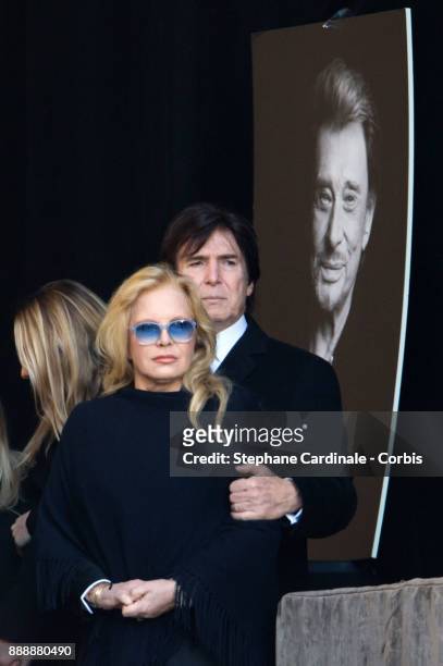Sylvie Vartan and Tony Scotti during Johnny Hallyday's Funeral at Eglise De La Madeleine on December 9, 2017 in Paris, France. France pays tribute to...