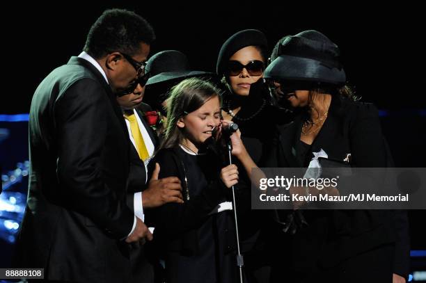 In this handout provided by Harrison Funk and Kevin Mazur, Tito Jackson, Randy Jackson, Paris Jackson, Janet Jackson and Rebbie Jackson attend...