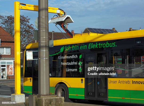 Tranport, road traffic, passenger transportation, electric bus at a charging station, Battery electric bus Solaris Urbino, current collector, bus of...