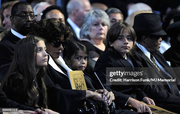 In this handout provided by Harrison Funk and Kevin Mazur, Paris Jackson, Katherine Jackson, Prince Michael Jackson II, Prince Michael Jackson, Joe...