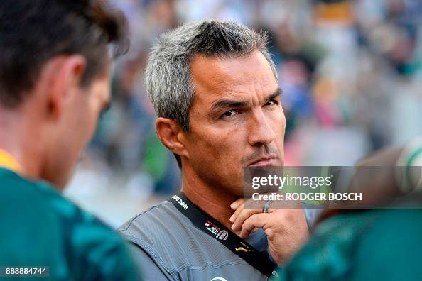 Neil Powell South Africa's coach Neil Powell talks to his players after defeating ...