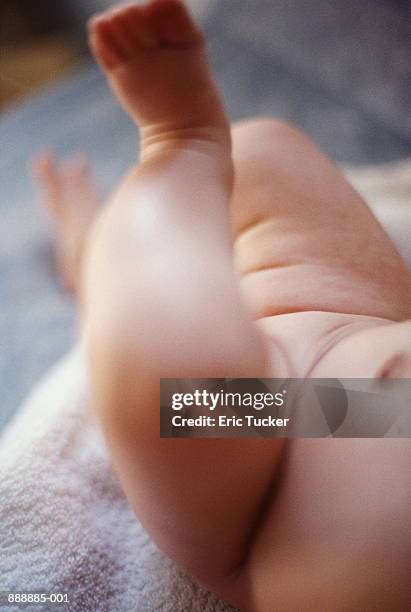 baby girl (3-6 months) kicking, close-up - baby kicking stock pictures, royalty-free photos & images