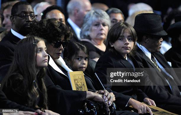 In this handout provided by Harrison Funk and Kevin Mazur, Paris Jackson, Katherine Jackson, Prince Michael Jackson II, Prince Michael Jackson, Joe...