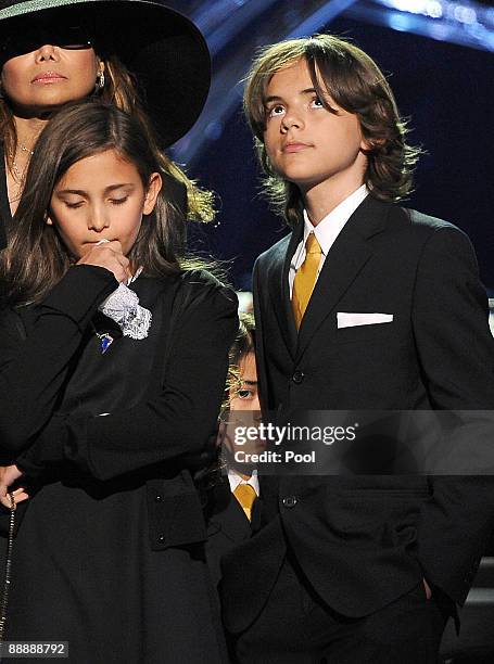 Michael Jackson's daughter Paris Jackson and sons Prince Michael Jackson II and Prince Michael Jackson stand with their aunt LaToya Jackson at the...