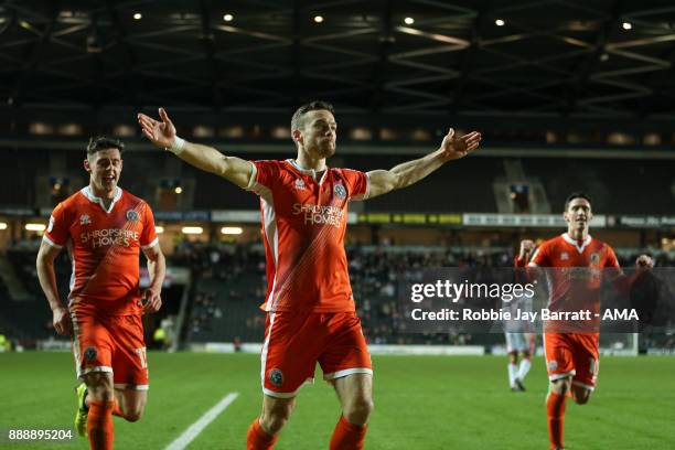 Shaun Whalley of Shrewsbury Town celebrates after scoring a goal to make it 1-1 during the Sky Bet League One match between Milton Keynes Dons and...