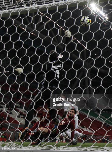 Magomed Ozdoyev of FC Rubin Kazan vies for the ball with Aleksandr Dovbnya SKA Khabarovsk during the Russian Premier League match between FC Rubin...