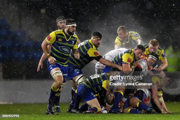 Tomos Williams of Cardiff Blues plays the ball out of a scrum during The European Rugby Challenge Cup match on December 9, 2017 in Salford, United...