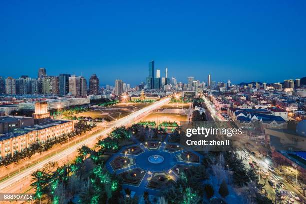 bustling dalian - peoples square stock pictures, royalty-free photos & images