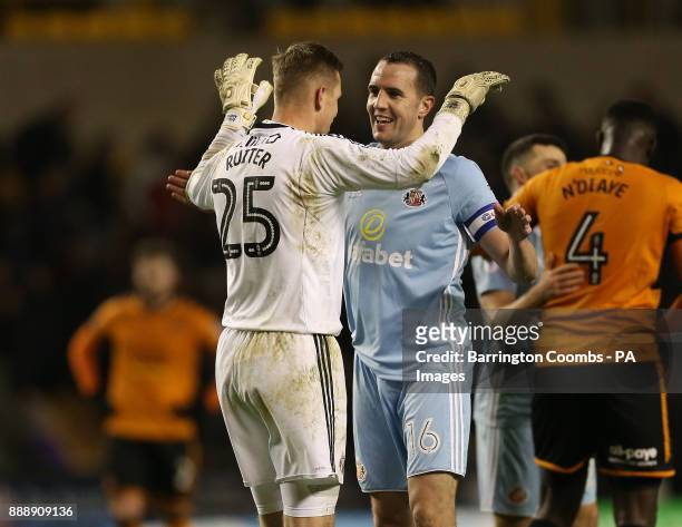 Sunderland's keeper Robbin Ruiter and team-mate John O'Shea celebrate the draw against Wolverhampton during the Sky Bet Championship match at...