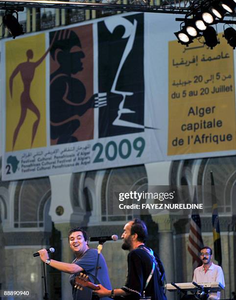 An Algerian Kabylie band performs at a music rally in front of the "Grande Poste" of Algiers City during the third day of the second Pan-African...