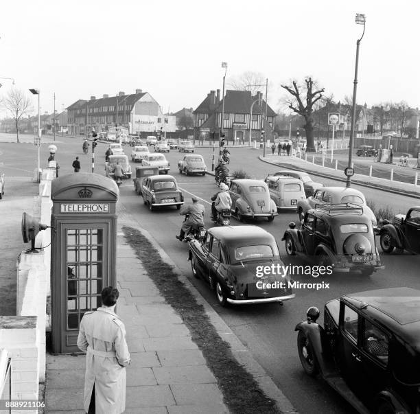 Traffic on the road heading to the south coast. The A20, Dover Folkestone Road, at New Eltham, London. February 1960.