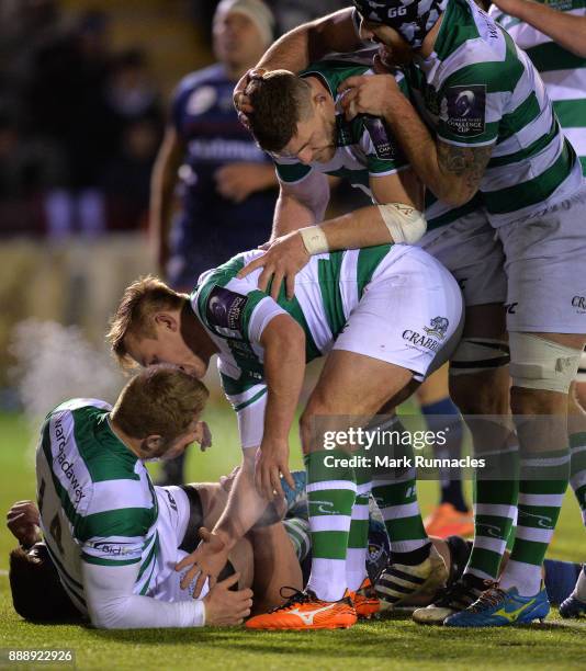 Alex Tait of Newcastle Falcons is congratulated by his team mates after scoring a try in the second half during the European Rugby Challenge Cup...