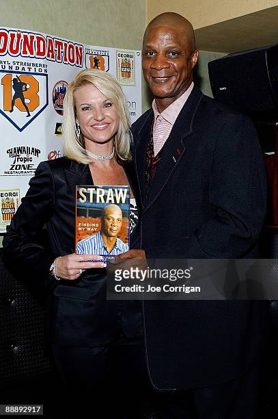 Former pro Baseball player Darryl Strawberry poses with his wife Tracy Strawberry at the "Straw: Finding My Way" book release party at Hawaiian...