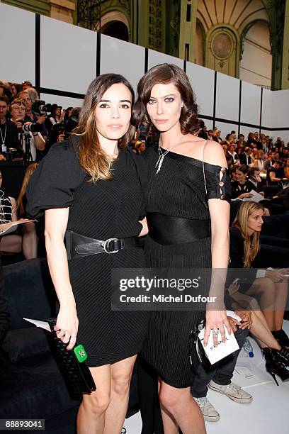 Elodie Bouchez and Anna Mouglalis attend the Chanel fashion show, a part of the Paris high fashion Week A/W 2009/10 at Grand Palais on July 7, 2009...